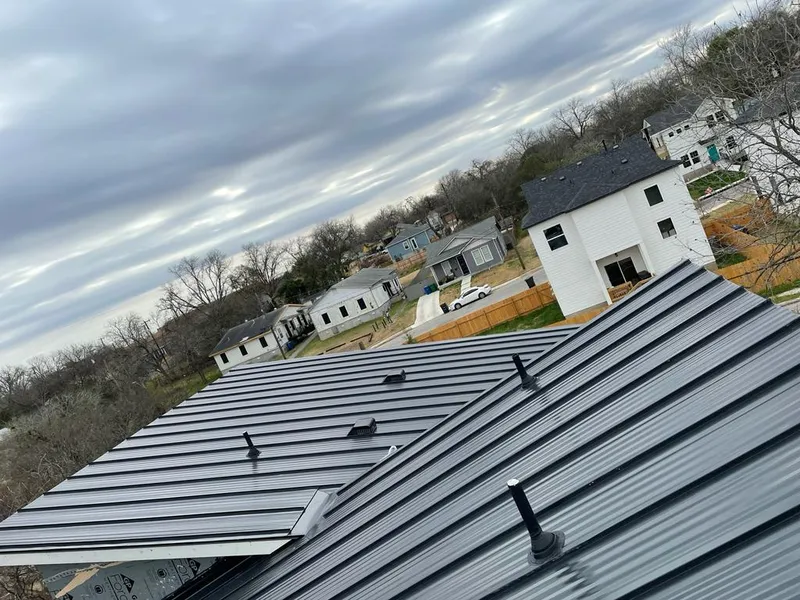 Standing seam metal roof panels with vents for Skylight Repair in Pampa